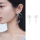 Getadme Korean Design Fashion Simple Silver Color Metal Line Bow Earrings Elegant Big Long Bowknot Drop Earrings Female